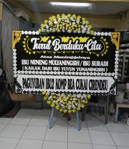 Papan Bunga Duka Cluwak